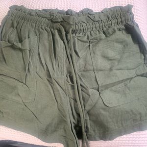 Green linen shorts